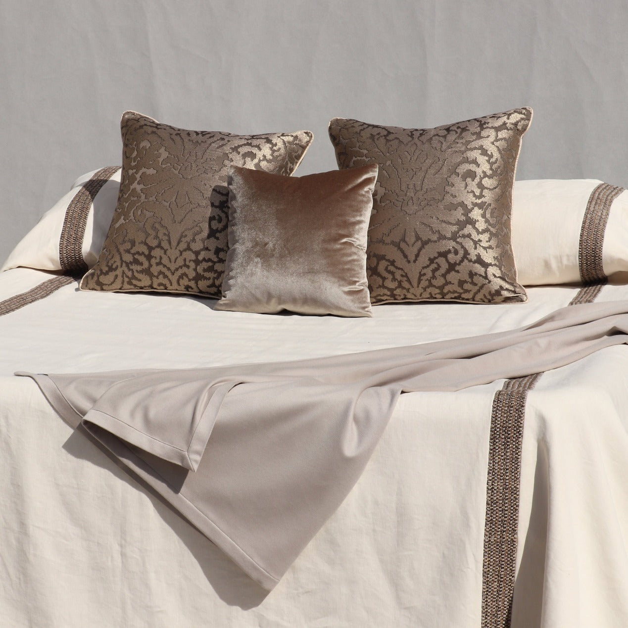 decorative cushion for sofas in fine fabrics such as silk, velvet, linen and cotton.